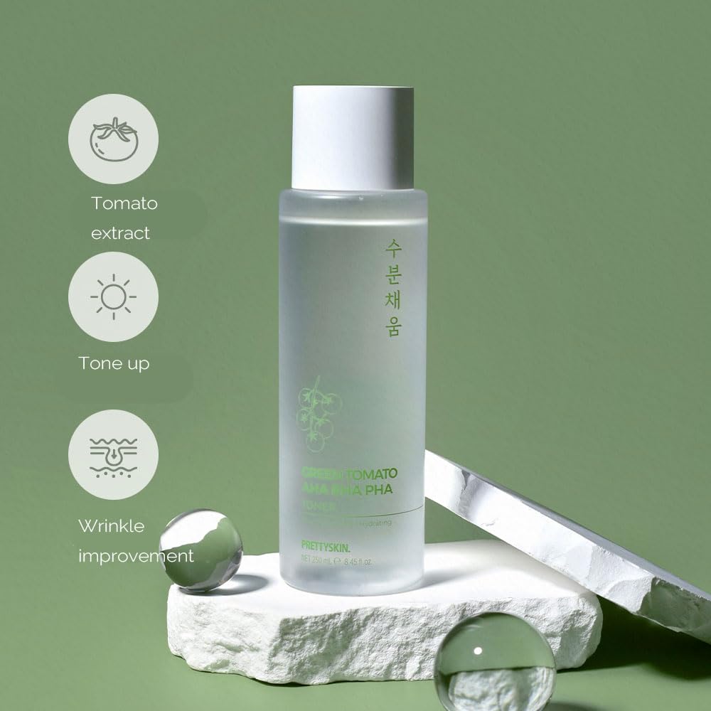 Closeup of PRETTYSKIN Tomato Toner label showing vitamin information and benefits.