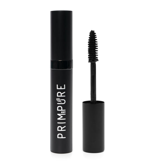 Prim and Pure mascara wand demonstrates precise application for defined lashes.