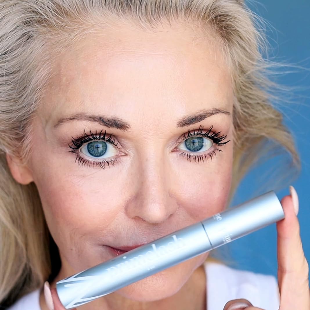 Prime Prometics PrimeLash separator brush ready to define lashes.