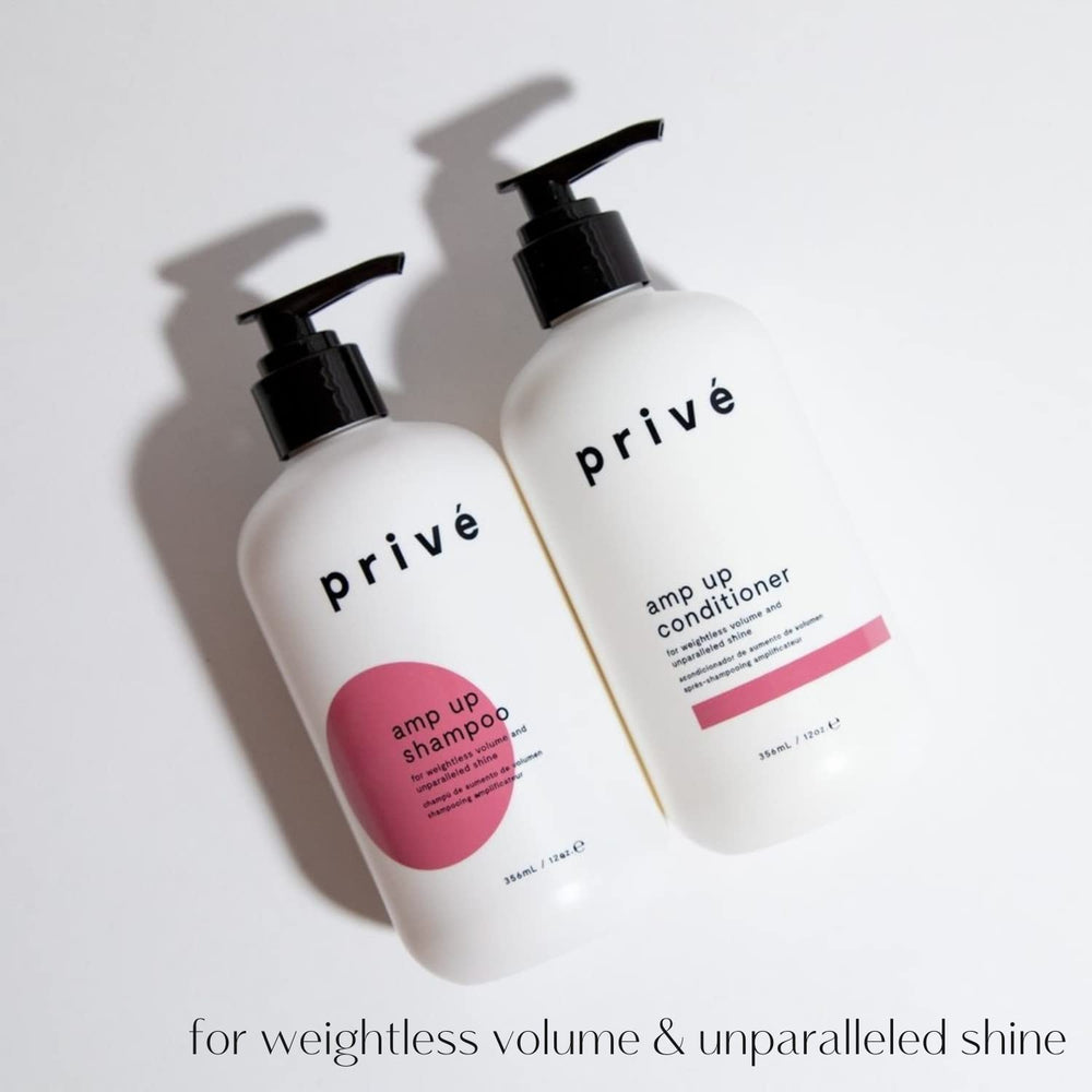 Lathered Privé Amp Up shampoo forming a silky foam
