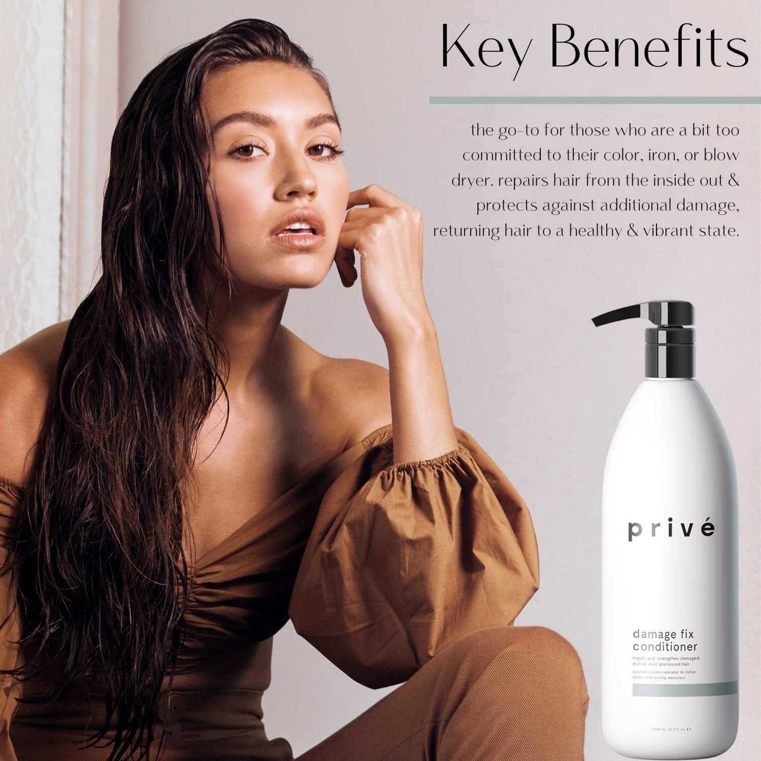 Close-up of Prive Damage Fix Conditioner on smooth, detangled hair.