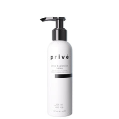 Privé Prep & Protect bottle pour, lightweight heat protection for smooth blowouts.