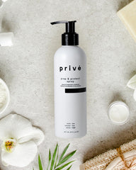 Privé Prep & Protect hair smoothing action detangles and reduces frizz for styling.