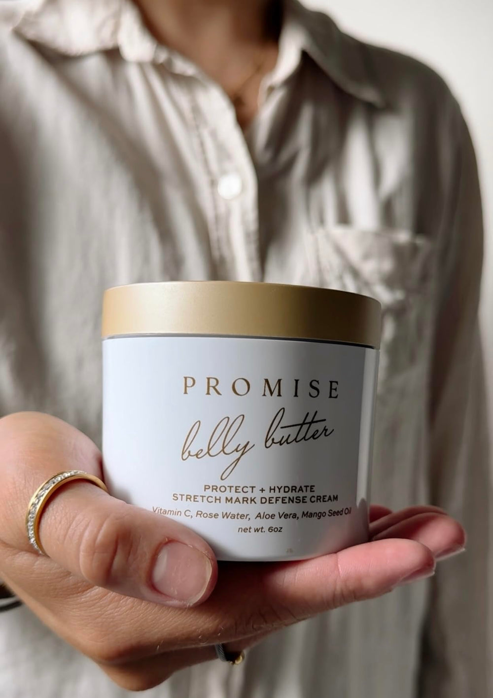 6-ounce Promise Belly Butter jar with vanilla citrus scent.