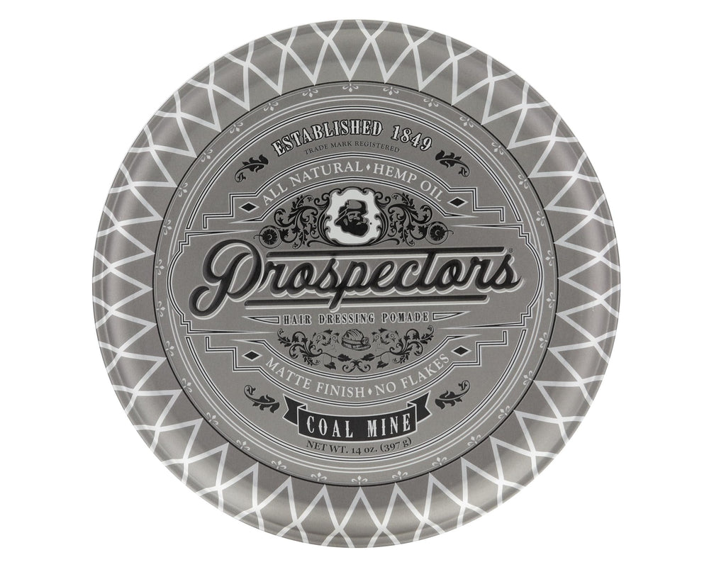 PROSPECTORS Coal Mine Matte Clay Pomade being warmed between hands for easy application.