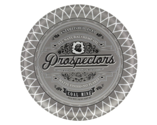 PROSPECTORS Coal Mine Matte Clay Pomade being warmed between hands for easy application.
