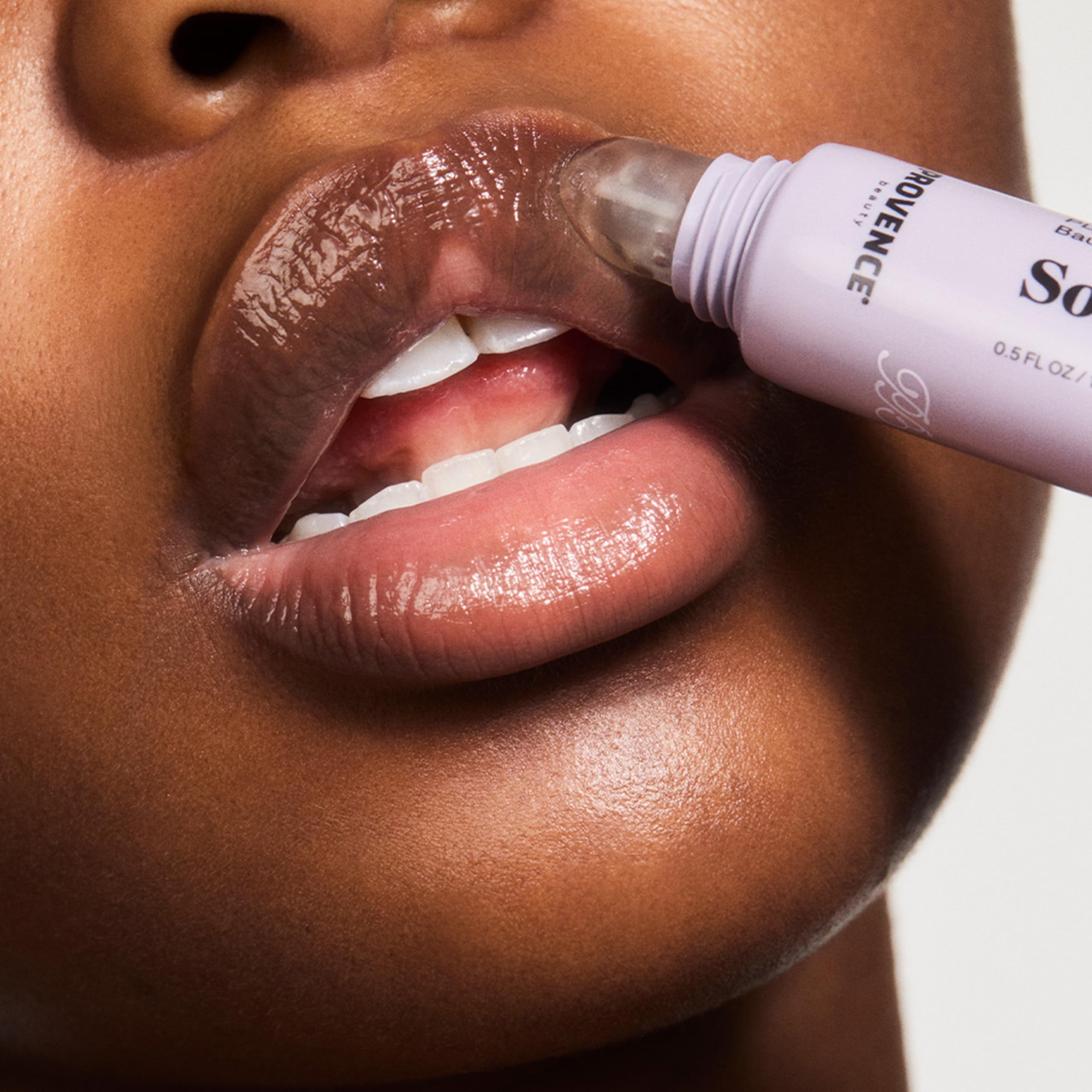 Provence Beauty Soft Bisous used as a lip primer before lipstick for smoother wear.