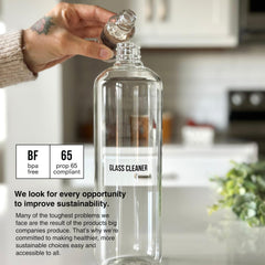 Public Goods glass spray bottle close-up ready for streak-free cleaning
