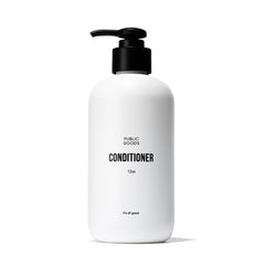 Public Goods conditioner bottle on sink highlighting natural ingredients for daily hydration.