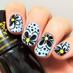 PUEEN brush applying stamping polish for smooth transfer.