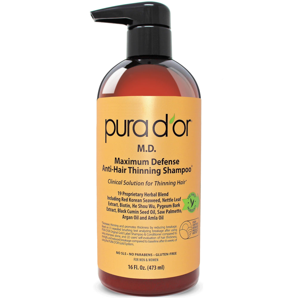 PURA D'OR Maximum Defense Shampoo bottle promotes hydration and fuller-looking hair.