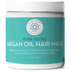 Pure Body Naturals ingredients bottles show argan and coconut oils.