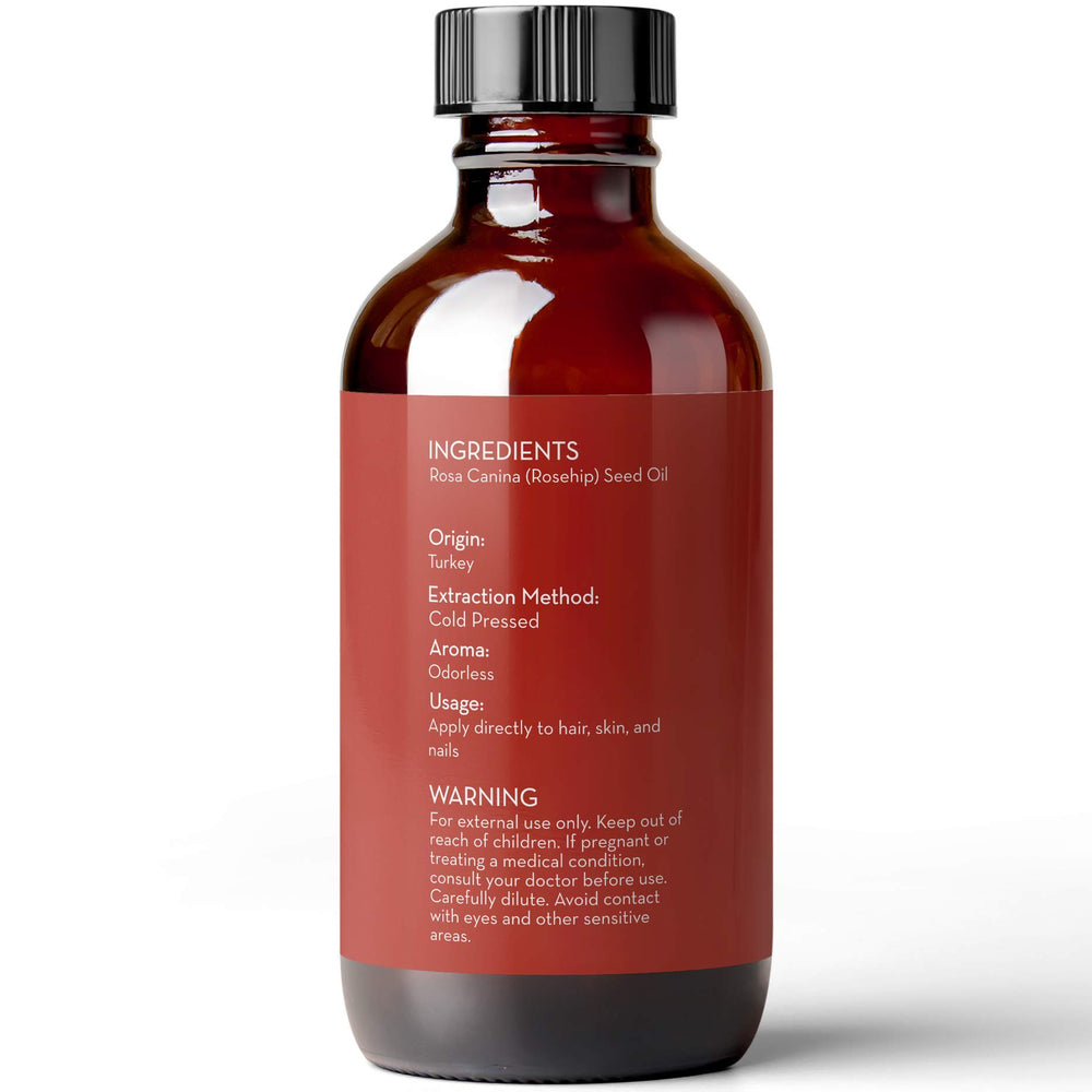 Pure Body Naturals Rosehip Oil seeds close-up highlighting natural ingredients.