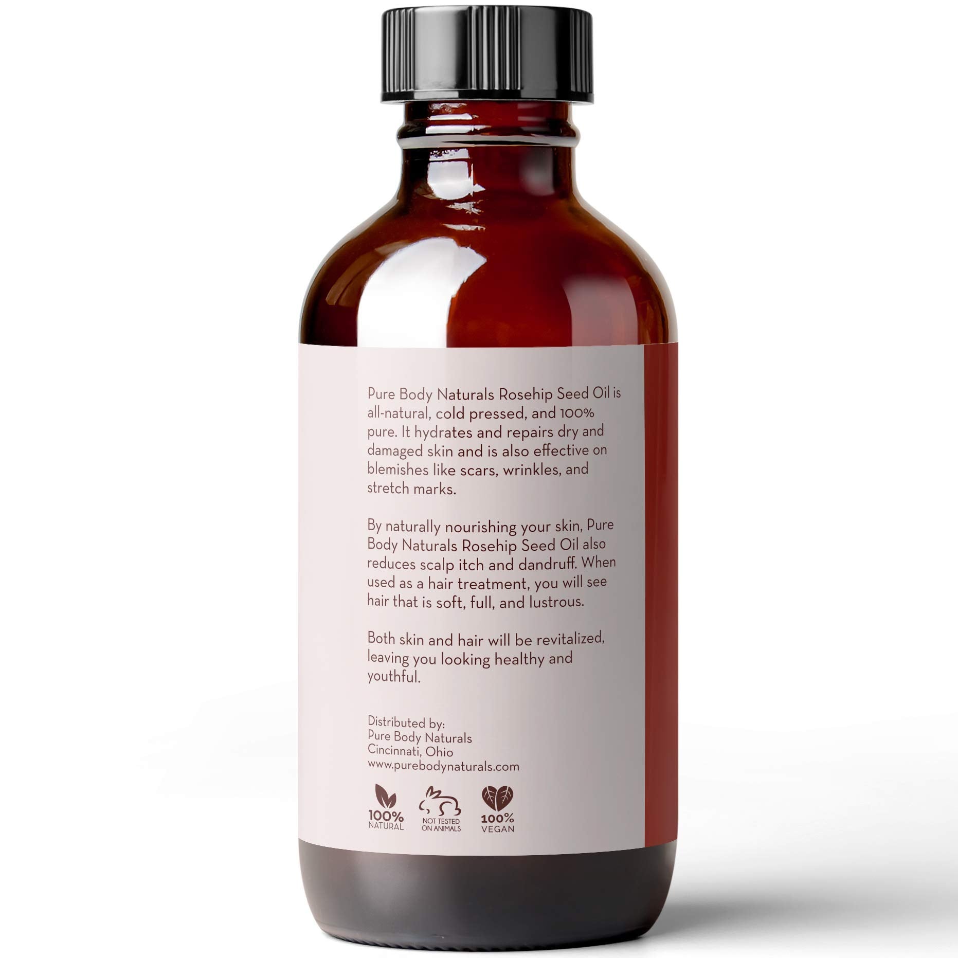 Close-up of Pure Body Naturals Rosehip Oil texture on the hand for hydration.
