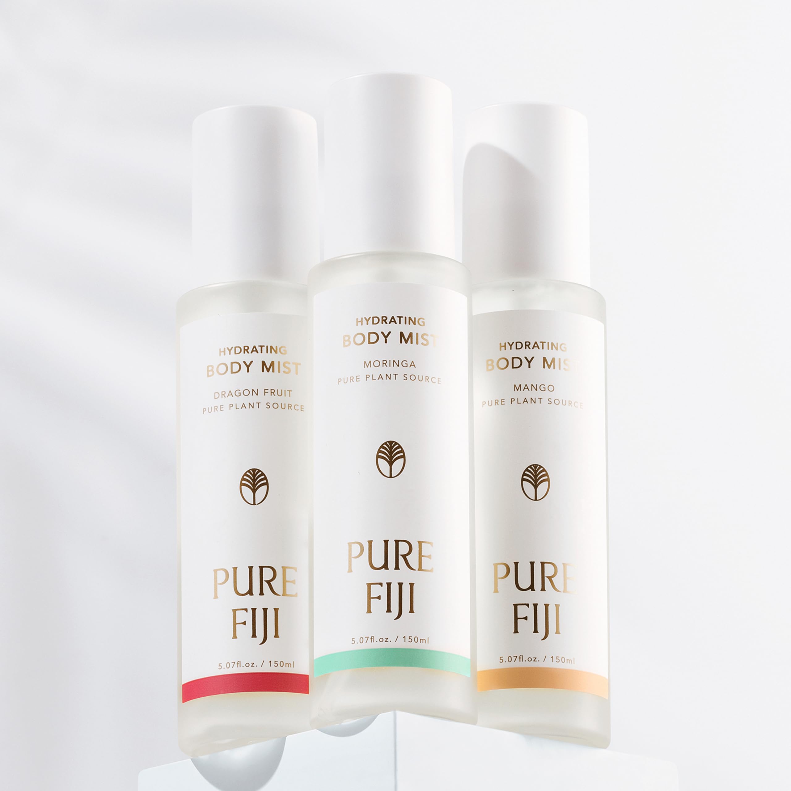 PURE FIJI Hydrating Body Mist on arm offers fresh feel and antioxidant vibes.