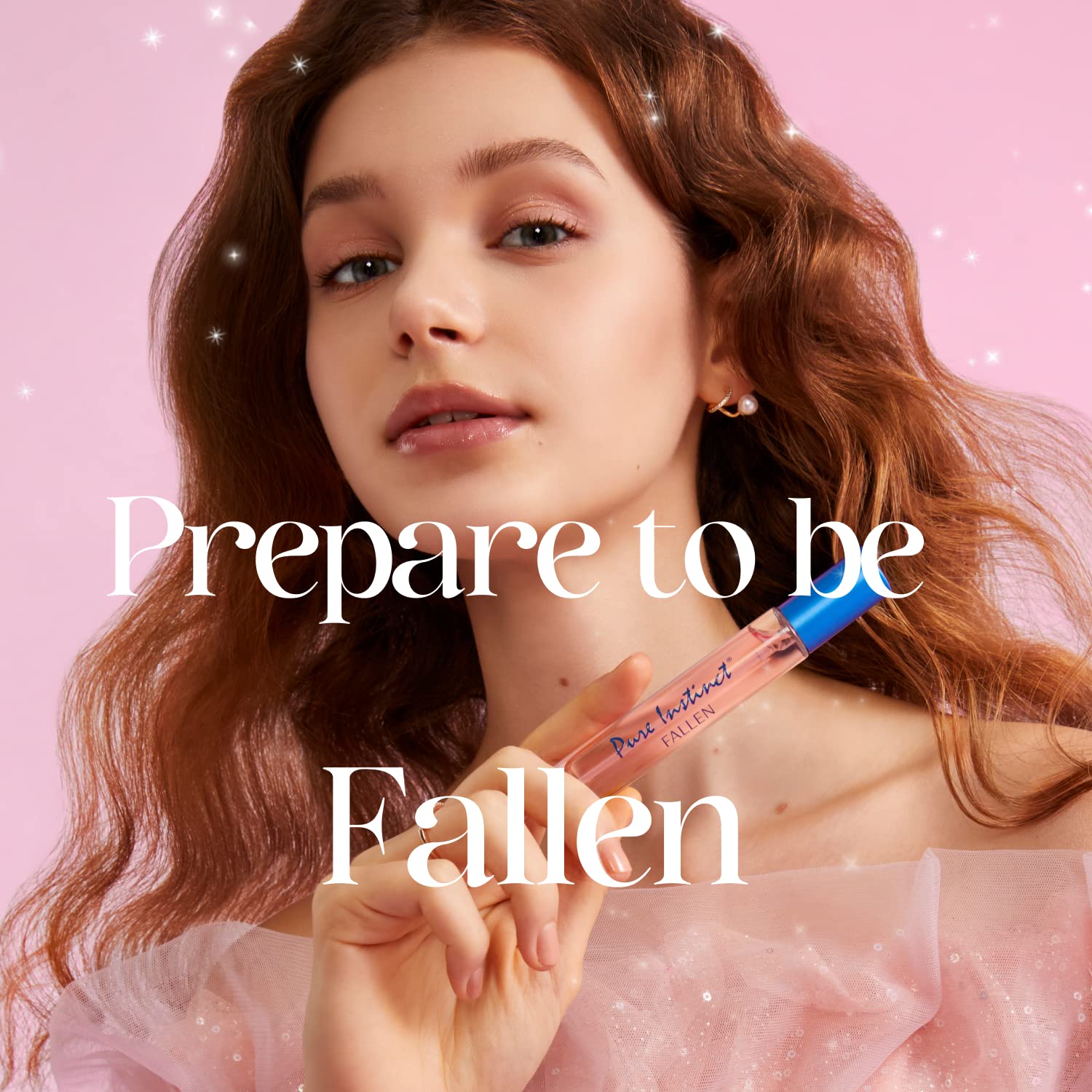 Pure Instinct Fallen spray-action close-up capturing mist for instant allure