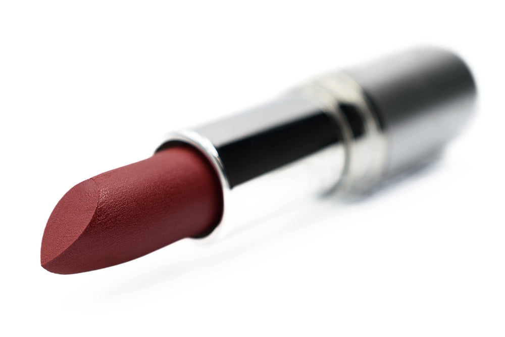 Pure Ziva Plum Wine lipstick deep violet on lips demonstrates rich coverage and moisturizing feel