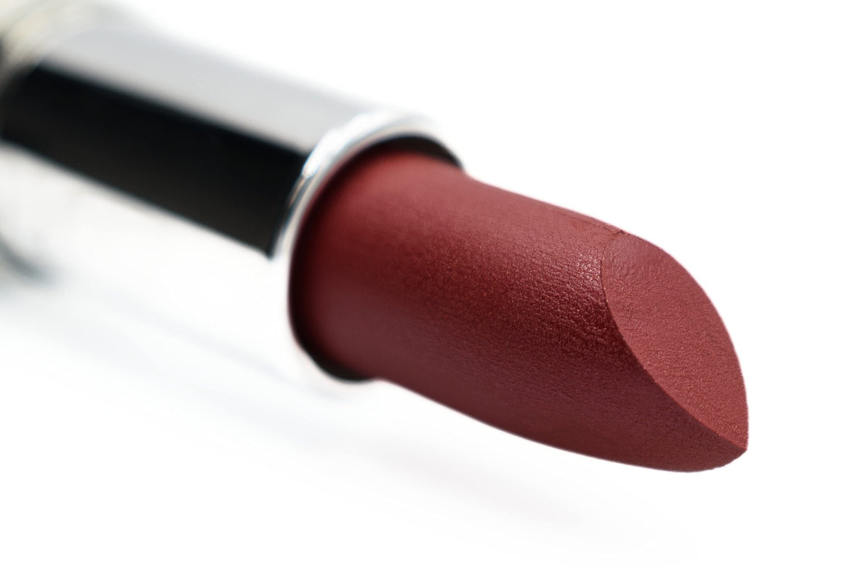 Pure Ziva Plum Wine lipstick swatches reveal deep violet color with creamy texture and lasting shine