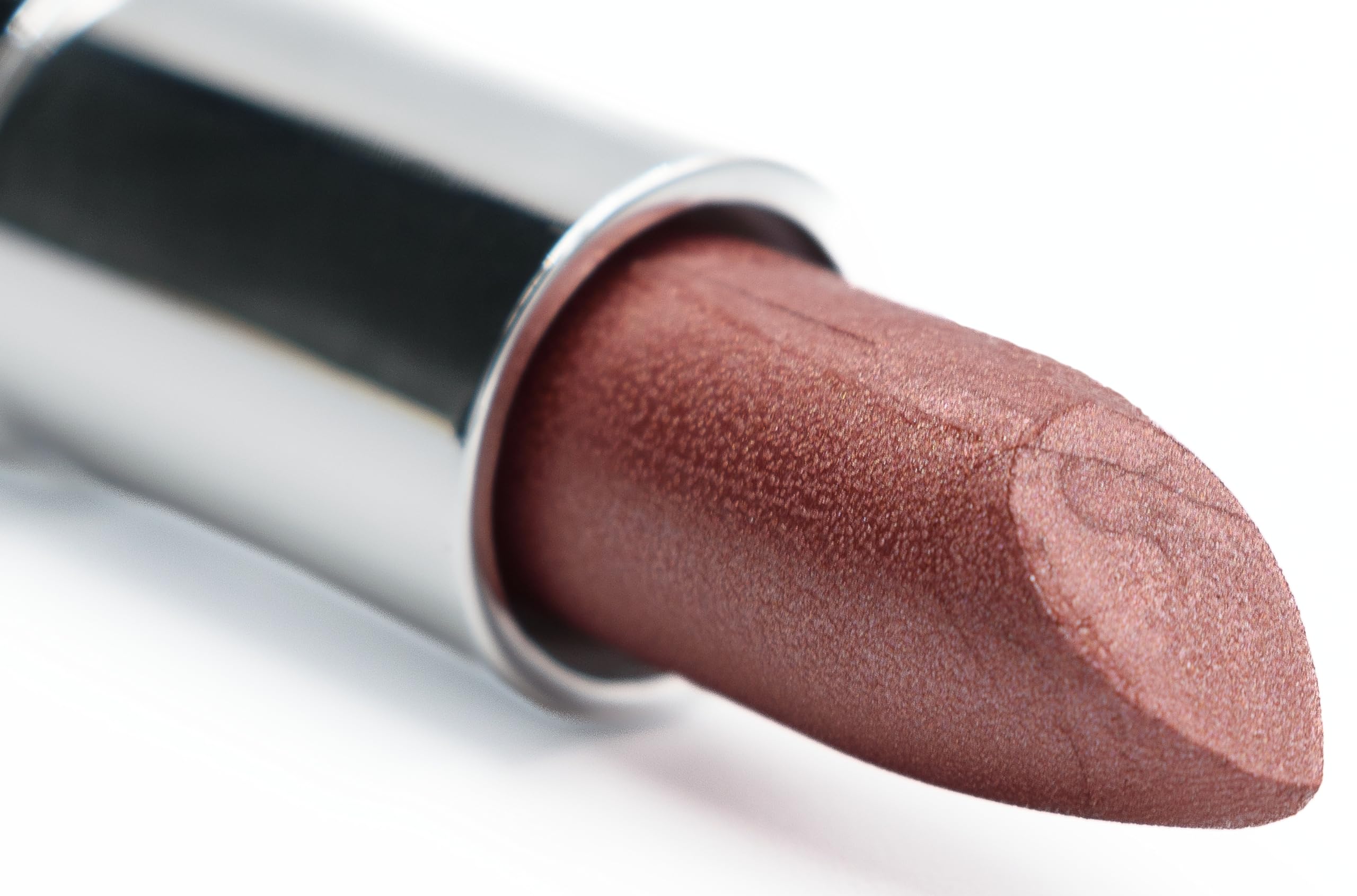 Pure Ziva Spicy Rum Nude Burgundy lipstick tube shows creamy color and subtle shimmer.
