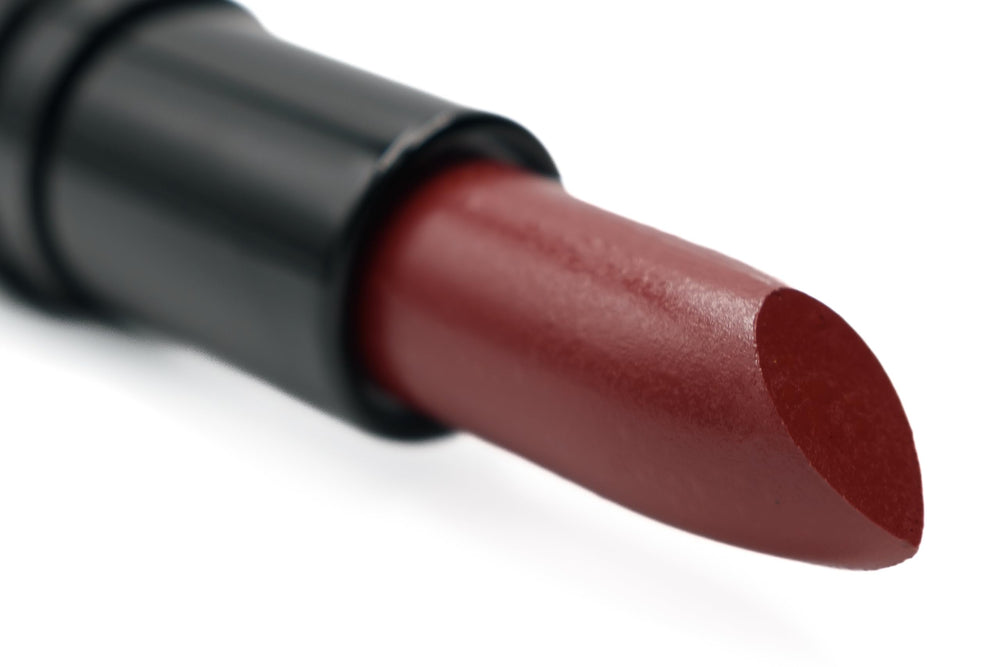 Pure Ziva Tempting lipstick swatch showing deep dark red shade for bold evening looks