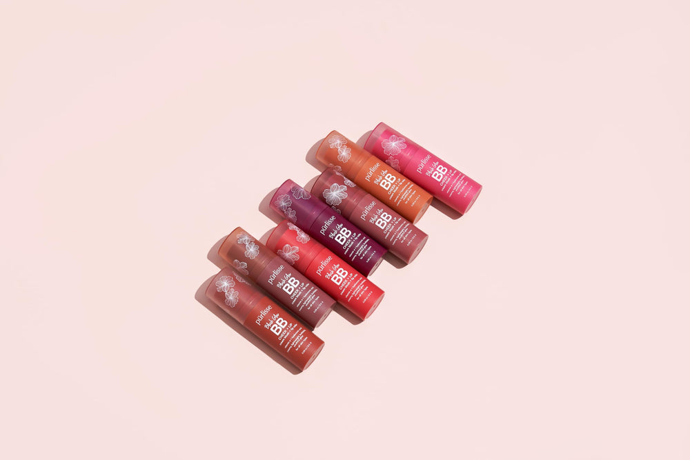 Purlisse Blush Glow swatch on lips and cheeks for versatile color.