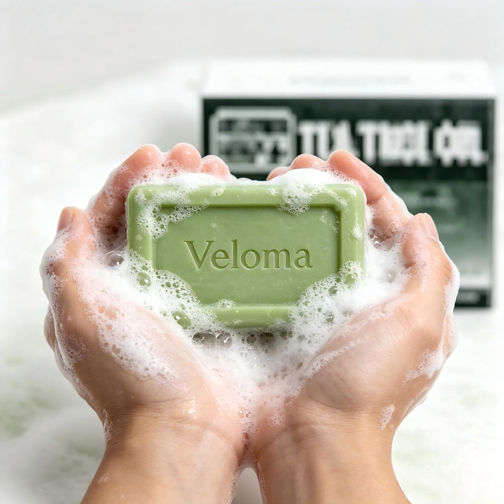 Qbustv Veloma soap in hand during use showing easy application