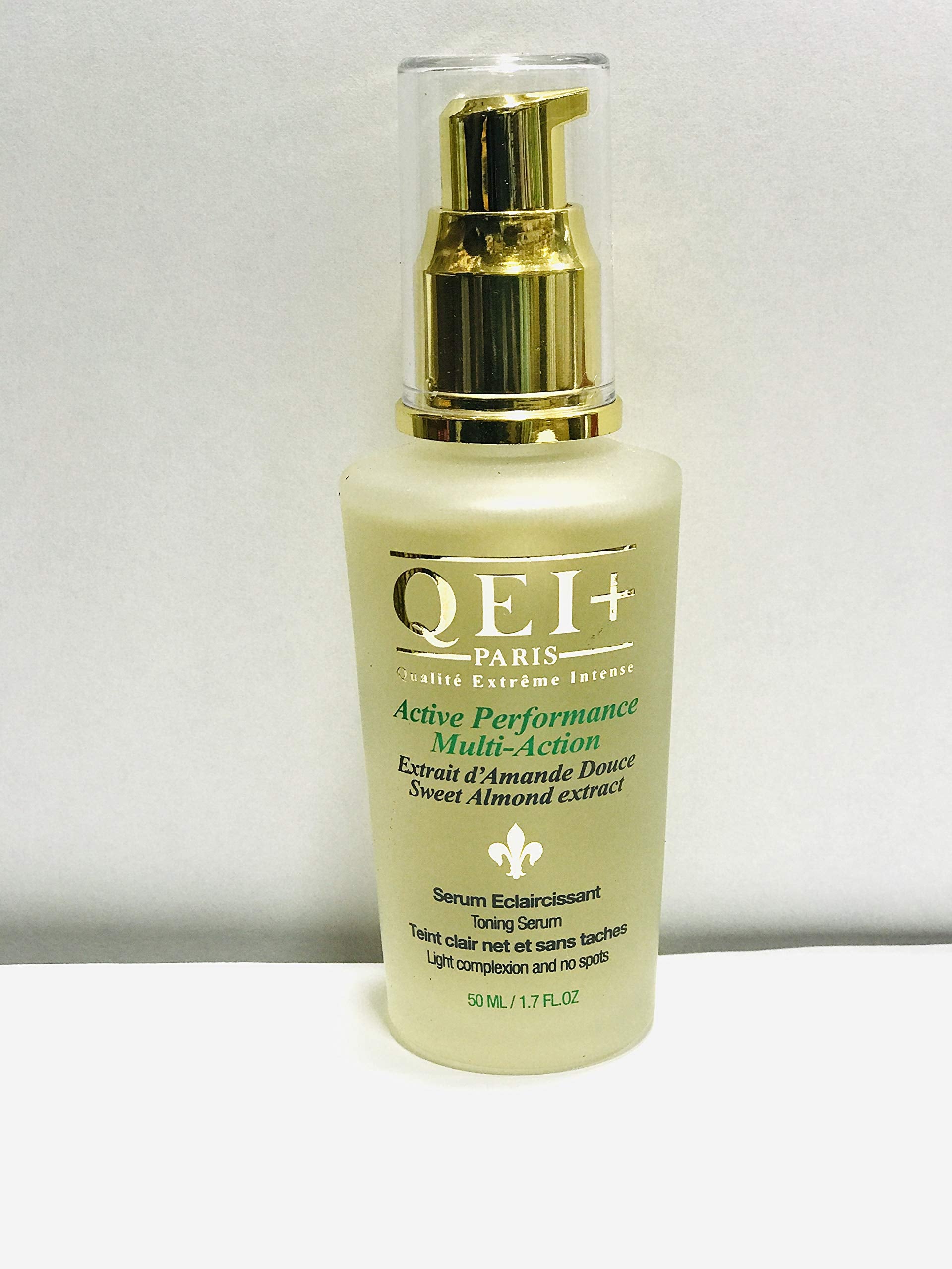 QEI+ PARIS Active Serum bottle front with a tone-enhancing formula for all skin tones.