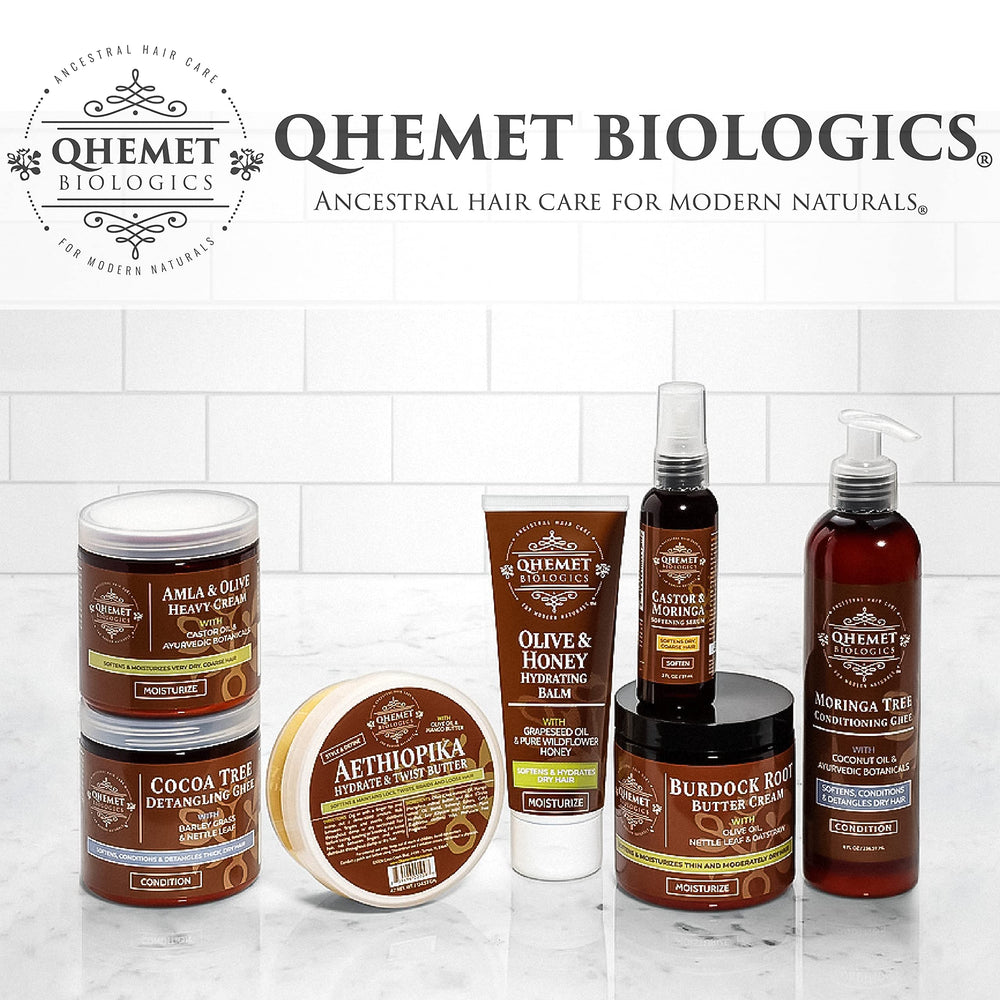 Qhemet Biologics MSM + Rosemary Scalp Balm creamy texture ready for application.