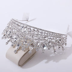 QIAIYALA tiara comb design keeps hair secure during dancing and photos.