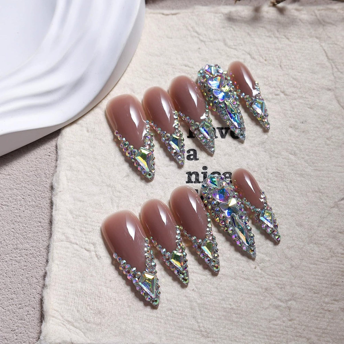 Qicaijia 10Pcs handmade nails with rhinestone French tip for glamorous long-stiletto manicure.