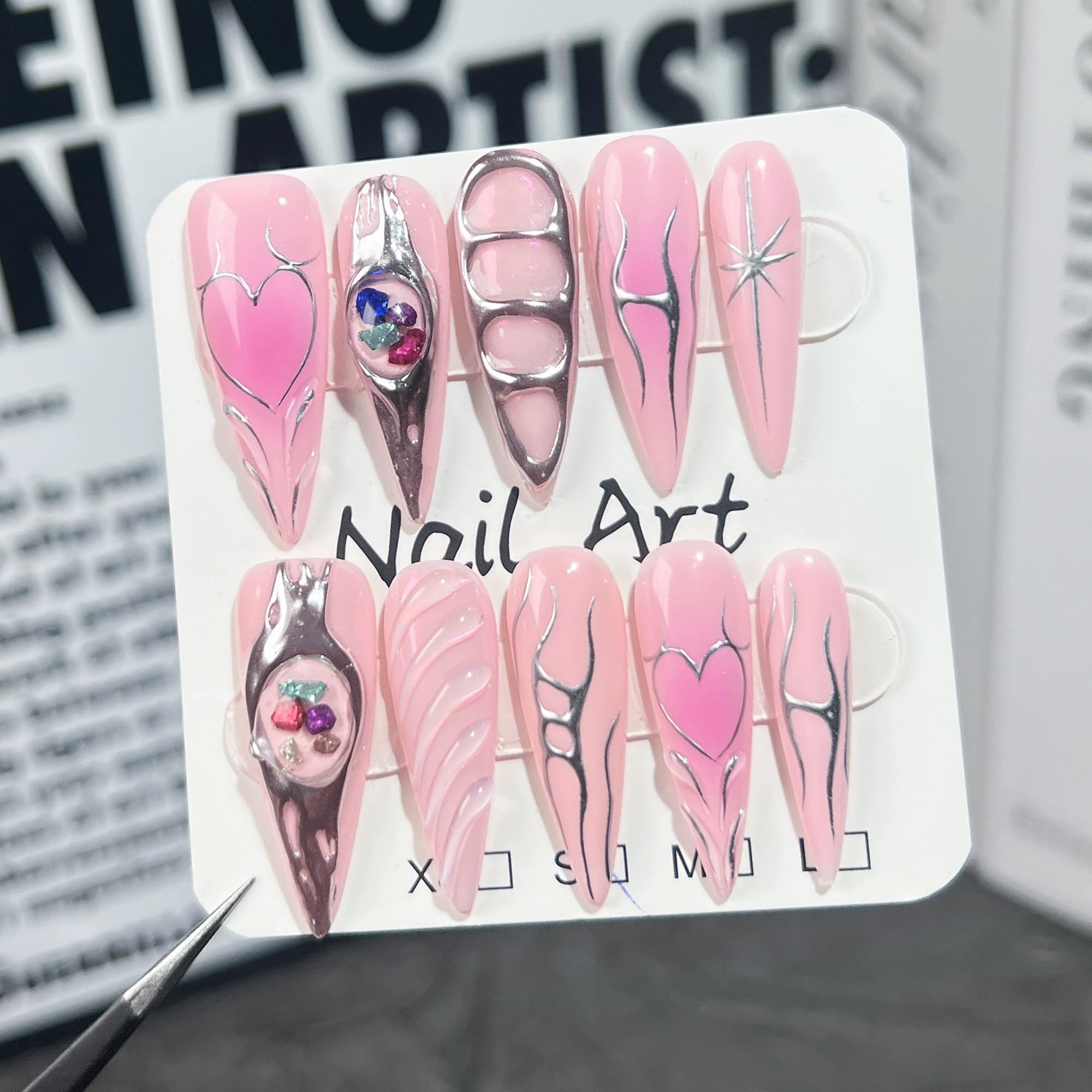 Qicaijia 3D design nails with pink ombre for a vibrant effect.