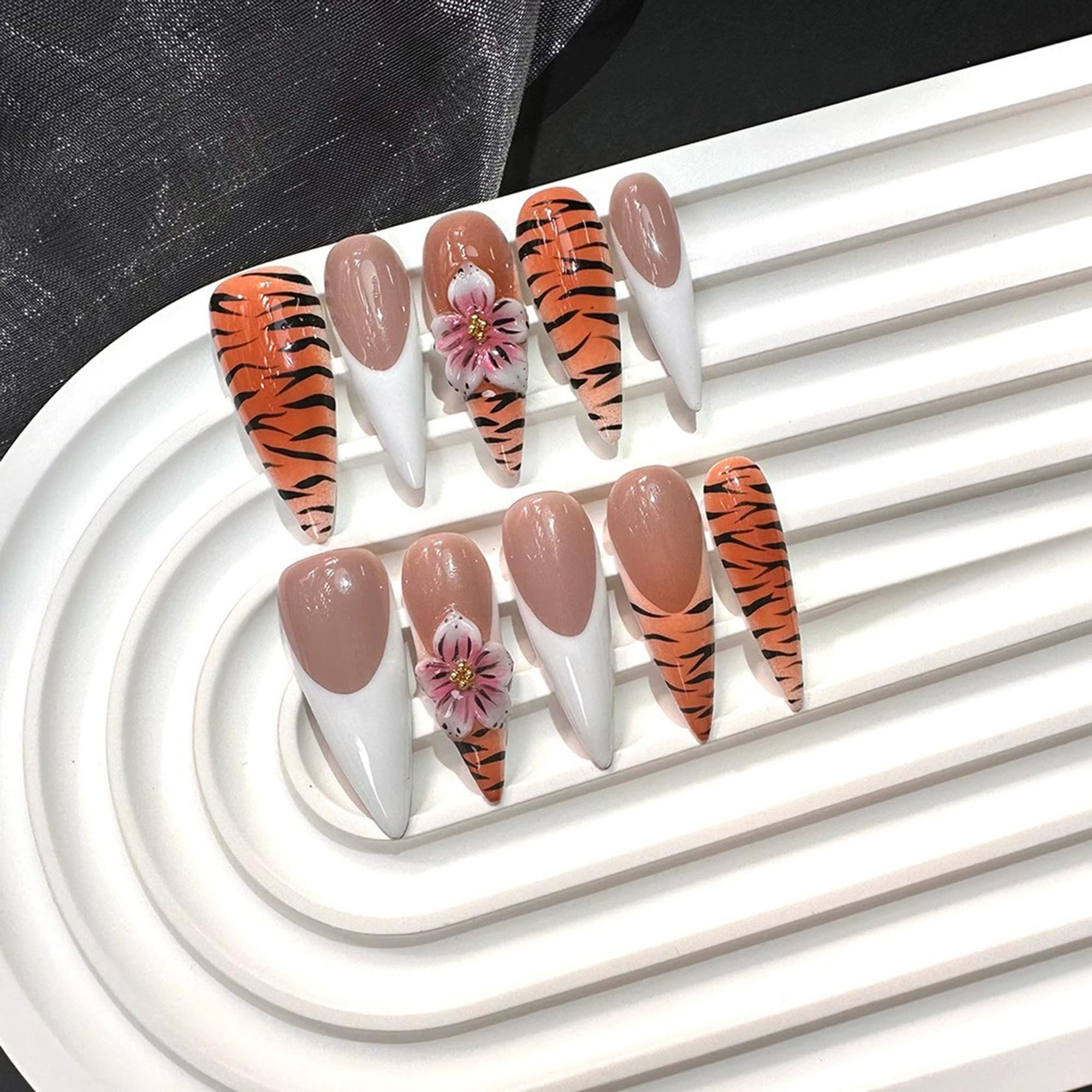 Qicaijia 3D flower acrylic nails with delicate texture and depth.