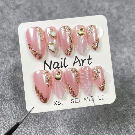 Qicaijia 3D ocean shell glue-on nails add texture and style to any look