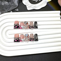 Qicaijia 3D sparkle nails in reusable ABS for durable, stylish wear.