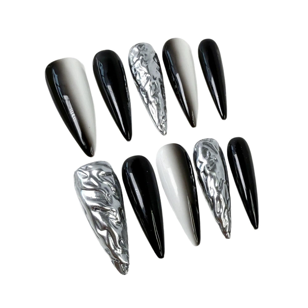 Qicaijia black white ombre stiletto nails for bold evening style.