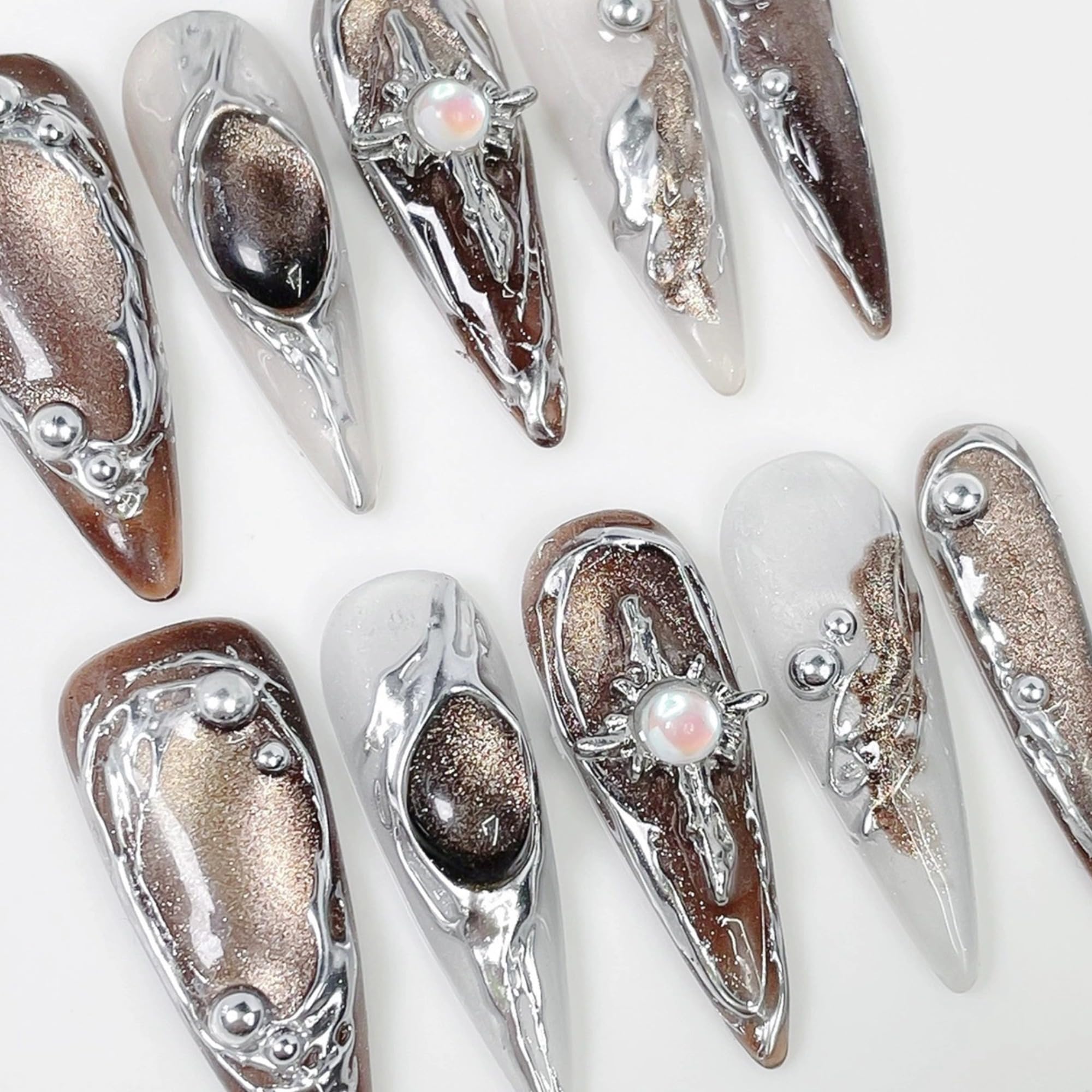 Qicaijia embossed swirl design adds texture to chic nails at home