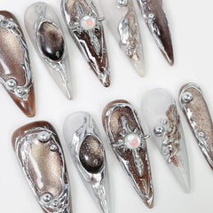 Qicaijia embossed swirl design adds texture to chic nails at home