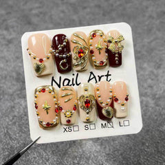 Qicaijia gold charms detail adds elegant accent for special occasions.