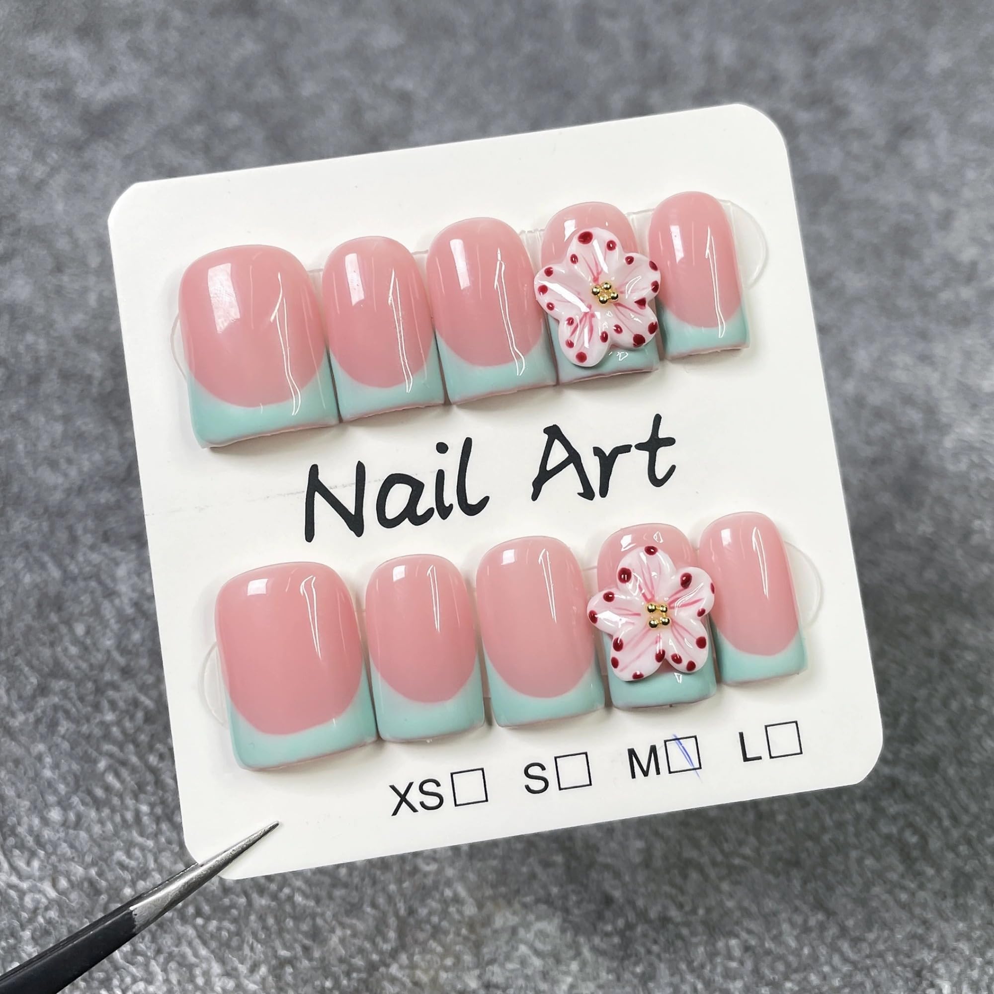 Qicaijia green French tip nails offering a chic, versatile look