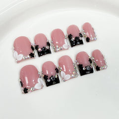 Qicaijia handmade press-on nails with black French tip offer chic, instant manicure.