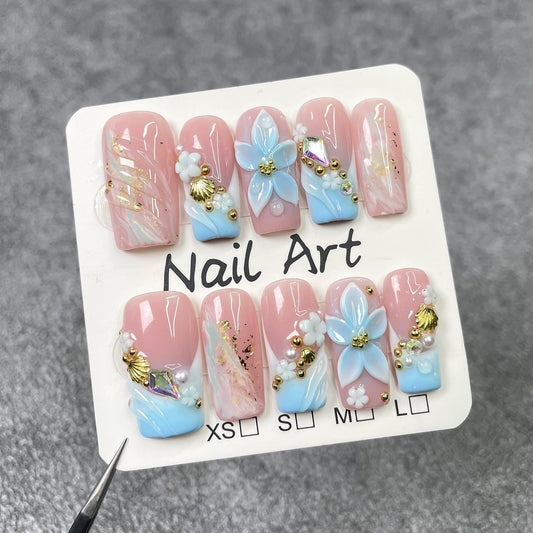 Qicaijia light-blue French nail design for chic home manicures.