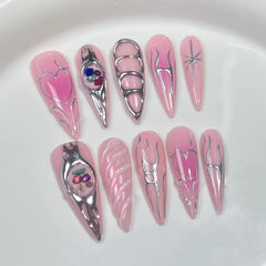 Qicaijia long press nails in pink almond ombre for a chic, reusable manicure.