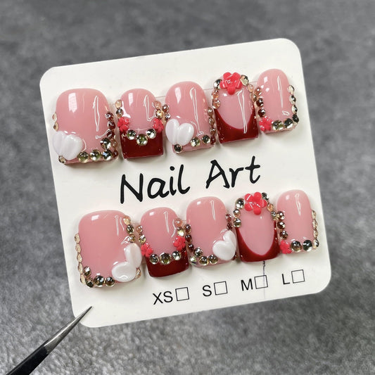 Qicaijia nails with included adhesive glue for quick, salon-like manicure at home.