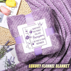 Qinline soft flannel blanket displayed for cozy evenings and relaxation.