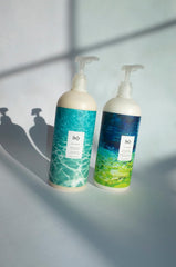 R+Co Atlantis conditioner application scene demonstrating targeted care