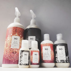 R+Co Bel Air smoothing conditioner application on damp hair for detangling.