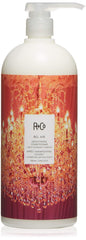 R+Co Bel Air smoothing conditioner bottle front showing silky, frizz-control conditioning.