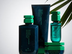 R+Co BLEU De Luxe Reparative Masque application image demonstrates detangling and conditioning benefits.