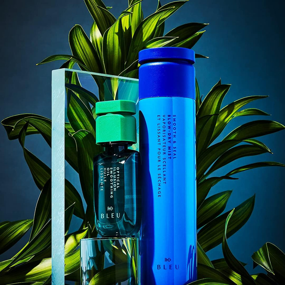 R+Co BLEU smoothing oil on hair with megawatt gloss