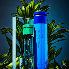 R+Co BLEU smoothing oil on hair with megawatt gloss